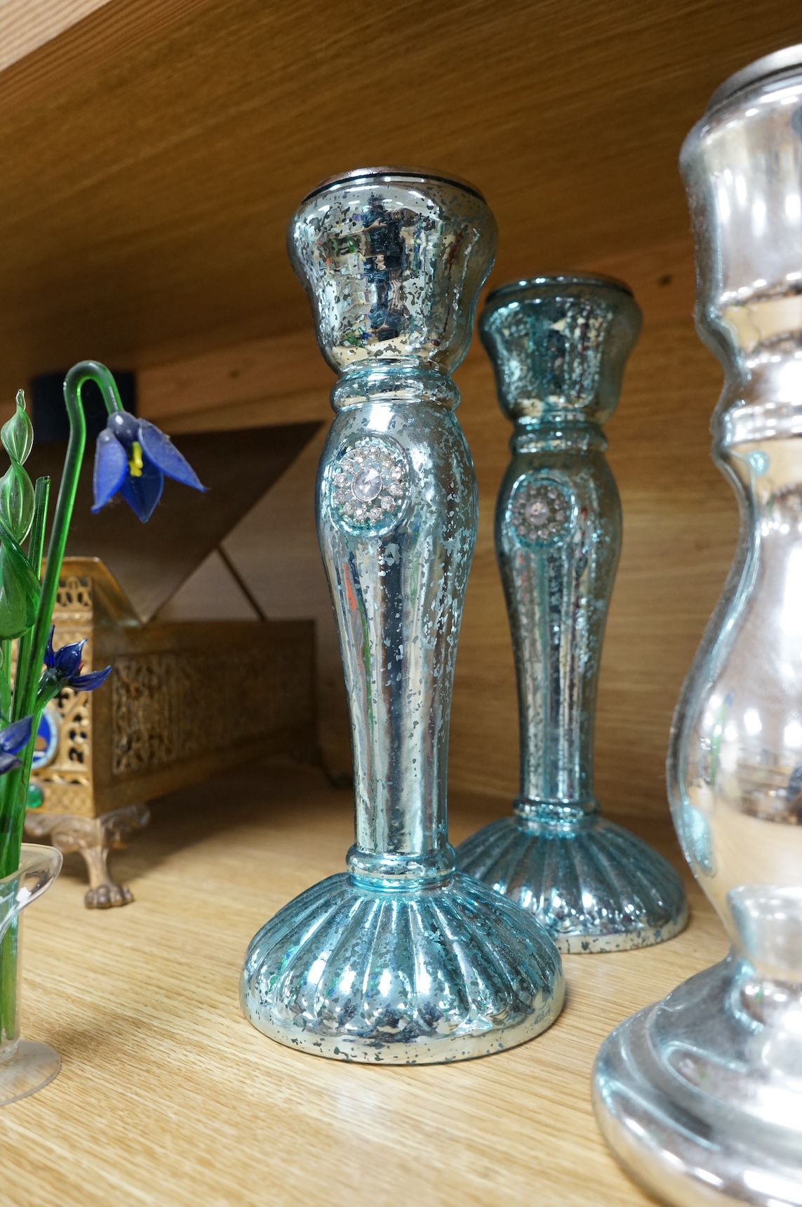 Three pairs of mirrored glass candlesticks and two small glass floral displays, largest 26cm high
